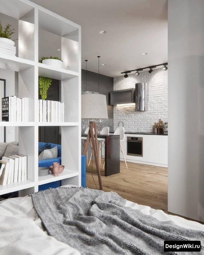 двоспальне ліжко у квартирі студії